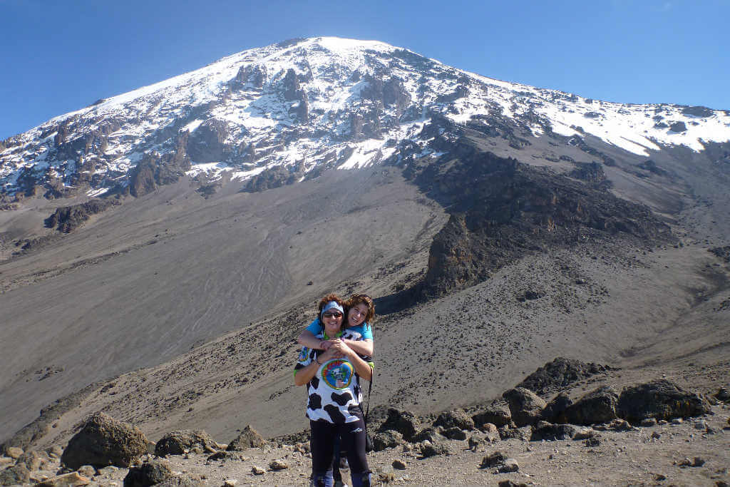 Standing in front of Mt Kilimanjaro in Tanzania