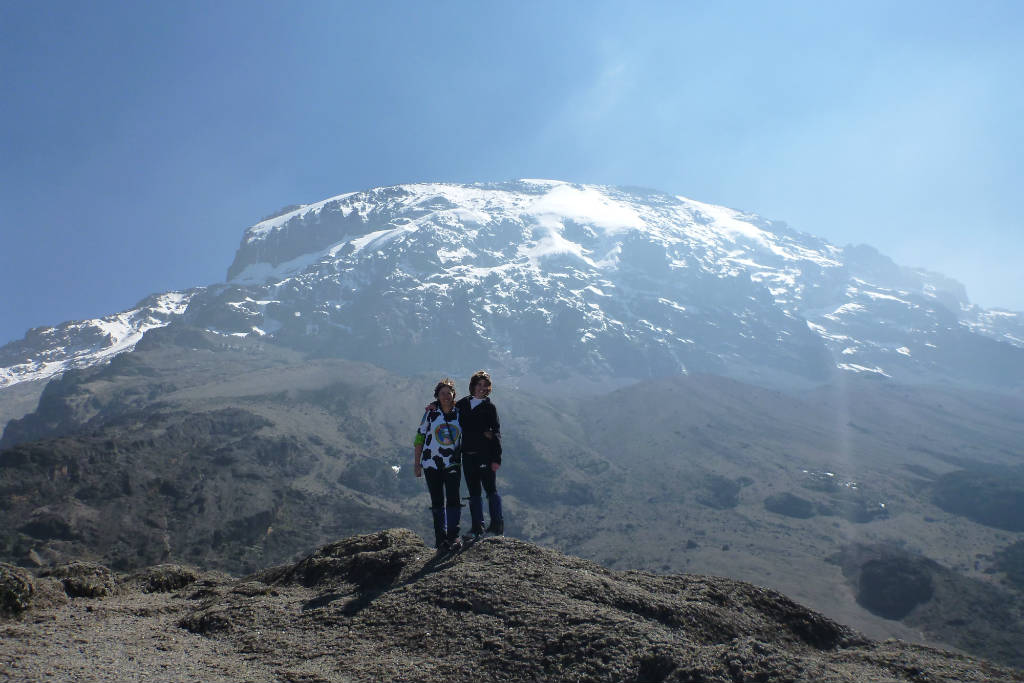 Standing in front of Mt Kilimanjaro in Tanzania