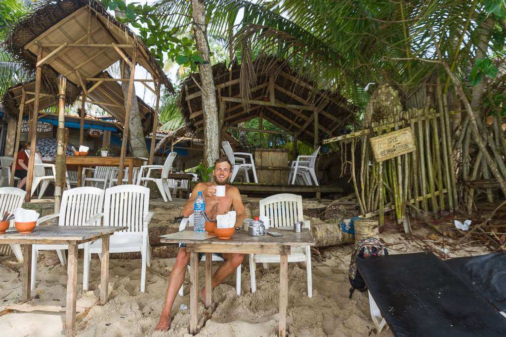 Enjoying our daily coffee at Beach House in Hiriketiya Bay