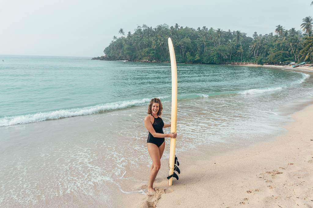 Learning how to surf in Hiriketiya, Sri Lanka
