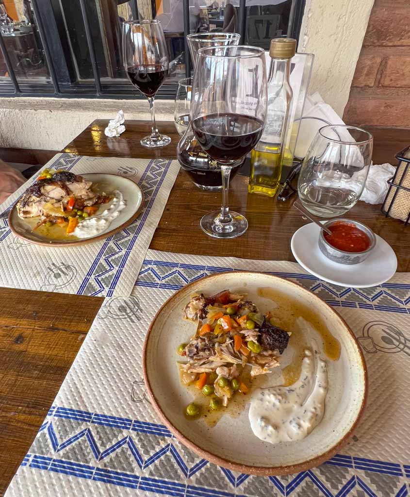 A plate of food with a wine pairing at a restaurant in Maipu, Mendoza
