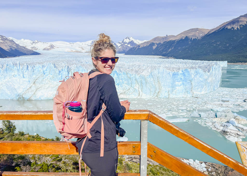 A woman standing at Perito Moreno Glacier walkways