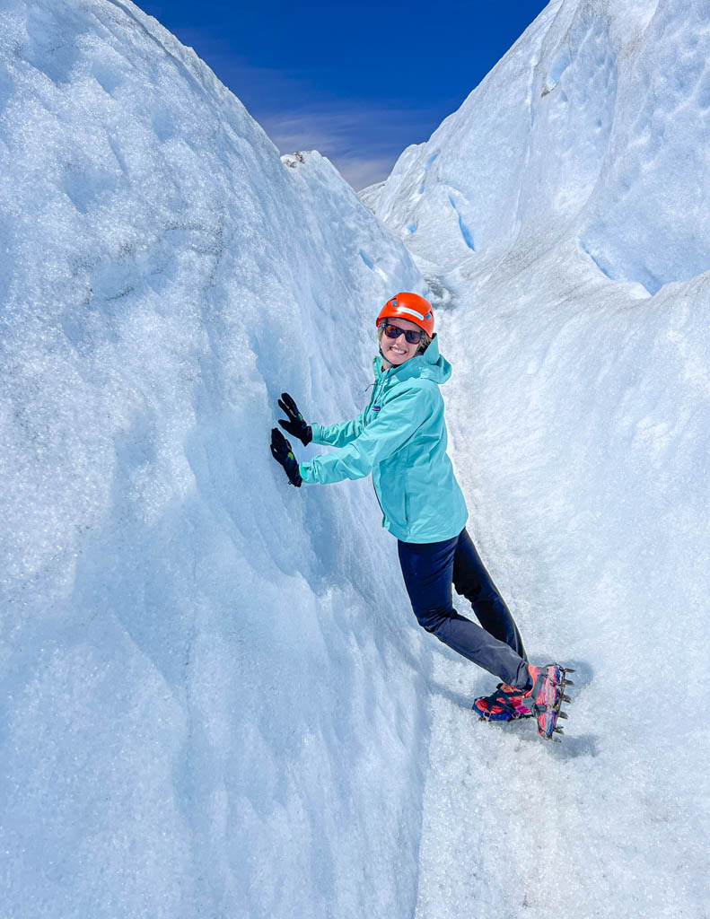 A women standing on Perito Moreno glacier in El Calafate