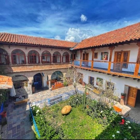 A courtyard of a hotel in Cusco